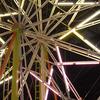 A 50-foot ferris wheel moving at a clip is the centerpiece of the carnival.